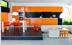 ORANGE is such a bold color and makes this kitchen as a retro place to cook and dine.